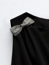 Foto: Zara, mini crna haljina s mašnicama