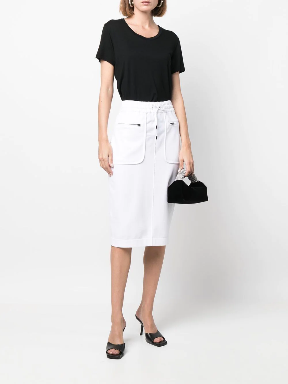 outfit s bijelom suknjom | Autor: Farfetch