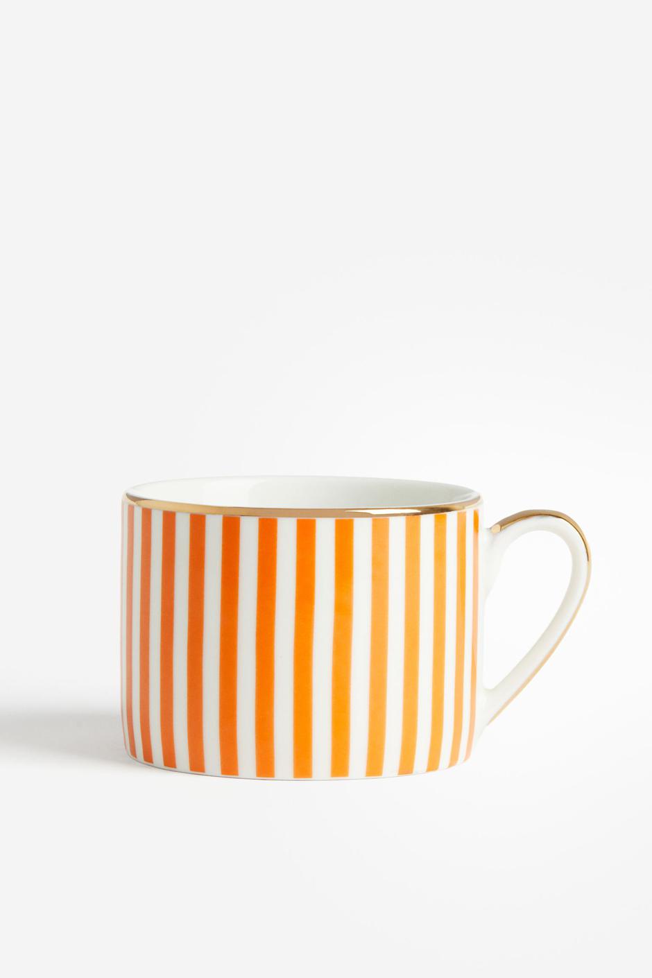 Foto: H&M, narančaste šalice sa zlatnim detaljima | Autor: H&M