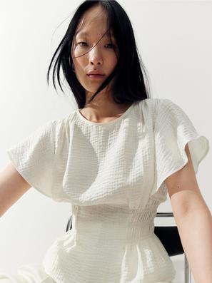 Foto: H&M, bijela bluza