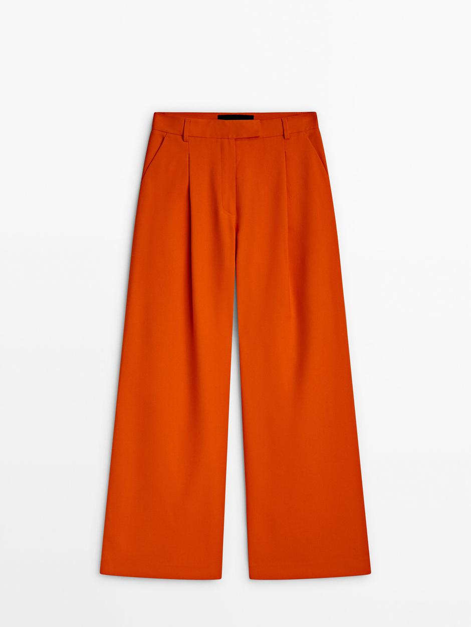 Foto: Massimo Dutti, hlače u jarko narančastoj boji širokog kroja (99,95 eura) | Autor: Massimo Dutti